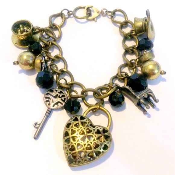Disney Brass Tone Black Bead Alice In Wonderland Themed Charm Bracelet - Picture 1 of 9